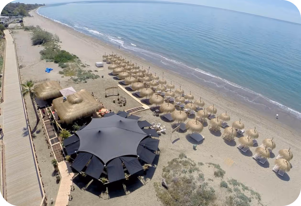 White stretch tent canopy over a restaurant terrace dining area